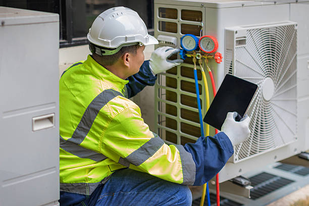 Professional Hvac technician working in Irvington, AL